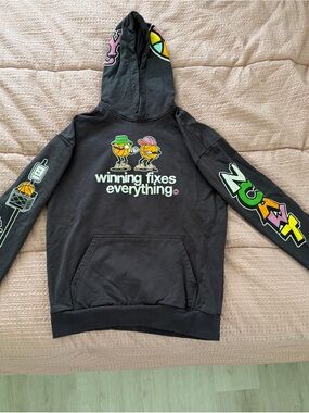Men's Black Graphic Hoodie - "Winning Fixes Everything"